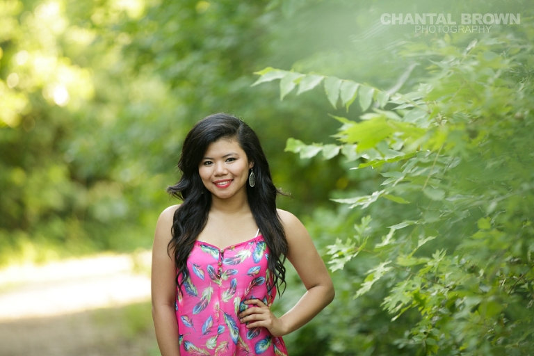 Carrollton tx senior portraits with Lien taken at Richardson Breckinridge Park with beautiful pink flower blouse by Chantal Brown Photography.