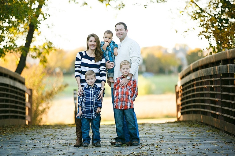 Dallas family picture standing on the bridge park for a fall session by Chantal Brown Photography