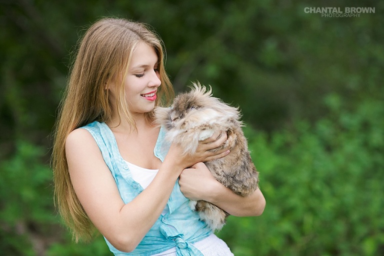 Greenville high school Addison senior portraits holding a cute bunny taken by Chantal Brown Photography.