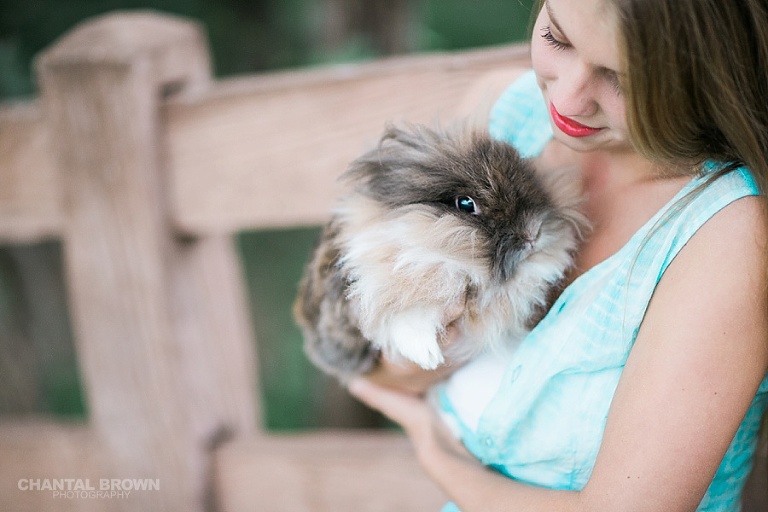 Gorgeous outdoor senior portraits of Greenhill high school senior picture holding a cute bunny taken by Chantal Brown photography of Dallas.