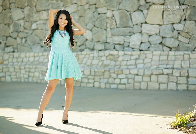 Beautiful sunlit of McKinney TX senior portrait at Adriatica Village taken by McKinney TX senior portrait photographer.