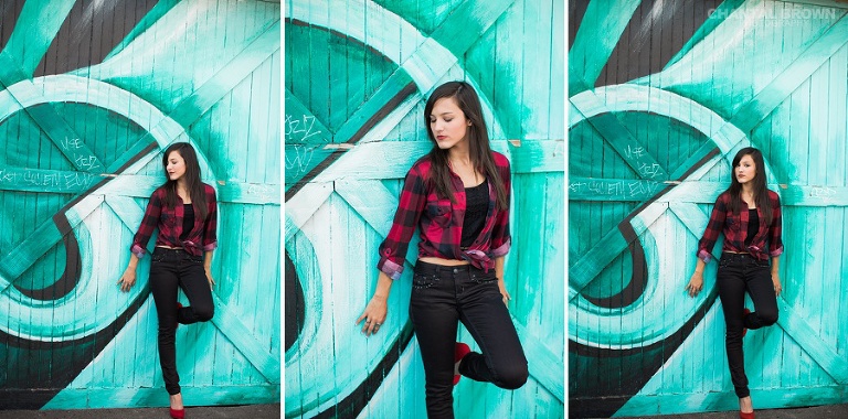 Deep Ellum high school senior pictures standing by the music wall in Dallas Texas.