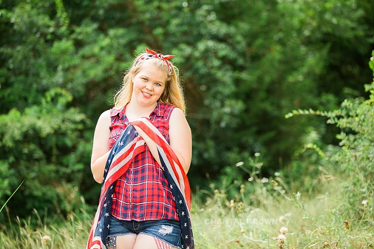 American flag inspiration Dallas senior portraits photographers outdoor photo shoot taken in Dallas for Carrollton high school student.
