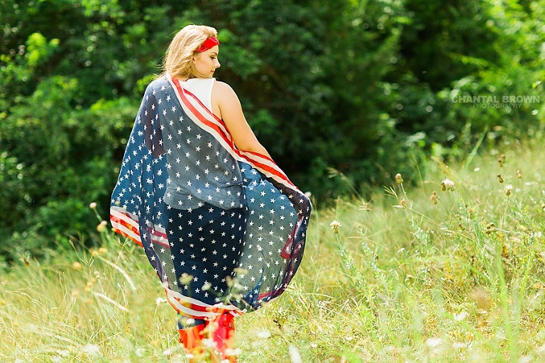 American flag senior portraits taken in Dallas of a Plano East High school student outdoor taken in high noon. www.chantalbrownphotography.com