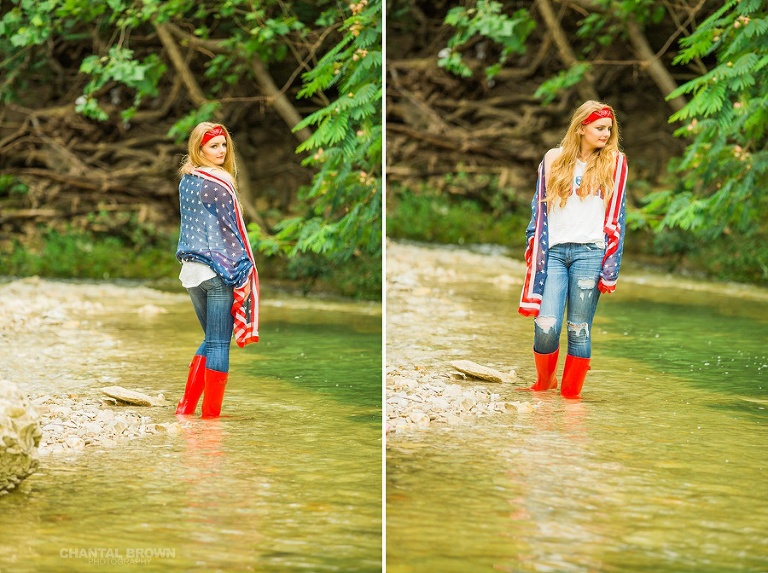 July 4th holding American flag scarf. This is a Dallas senior portraits styled photo shoot for a Plano high school student wearing a cute red boot in the water by the river. Taken by Dallas Chantal Brown Photography.